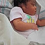 Aviana is registered to the contest to win money with this photo: baby, sleeping, blanket, infant, child, onesie, soft, cozy, peaceful, curly_hair, resting, indoor, cute, newborn, portrait, skin, hand, face, toddler, comfort