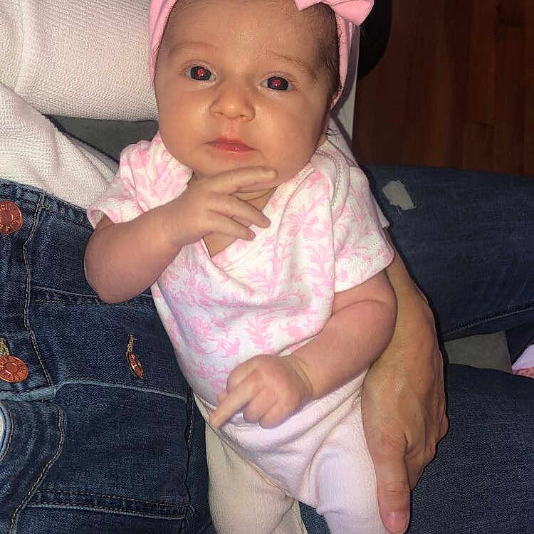 Audree is registered to the contest to win money with this photo: baby, baby_toddler_clothing, cheek, child, eye, hair_accessory, headgear, person, pink, skin, toddler