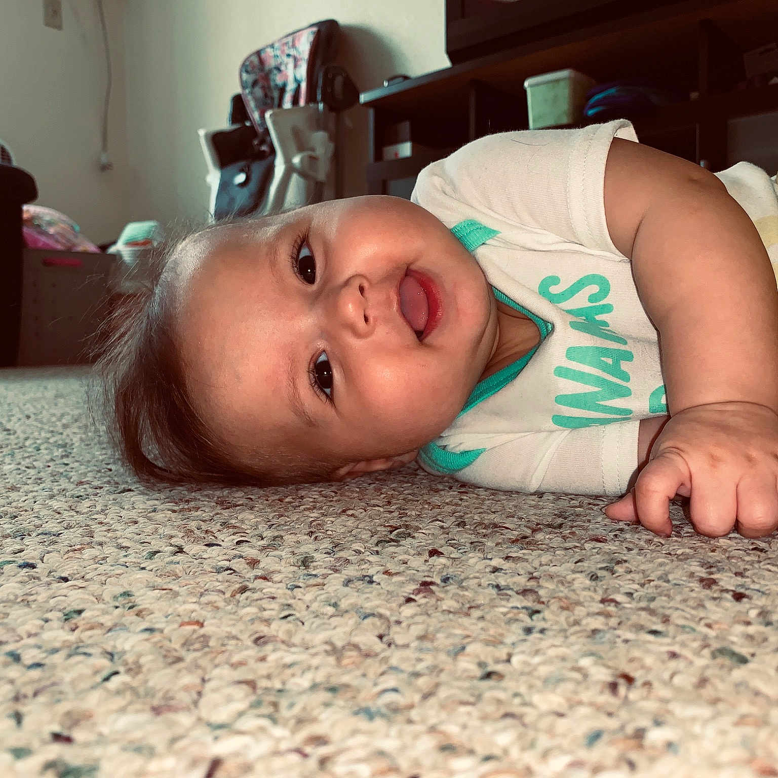 Laylah is registered to the contest to win money with this photo: baby, cheek, child, crawling, ear, eye, face, floor, flooring, head, lip, mouth, nose, skin, toddler, tummy_time