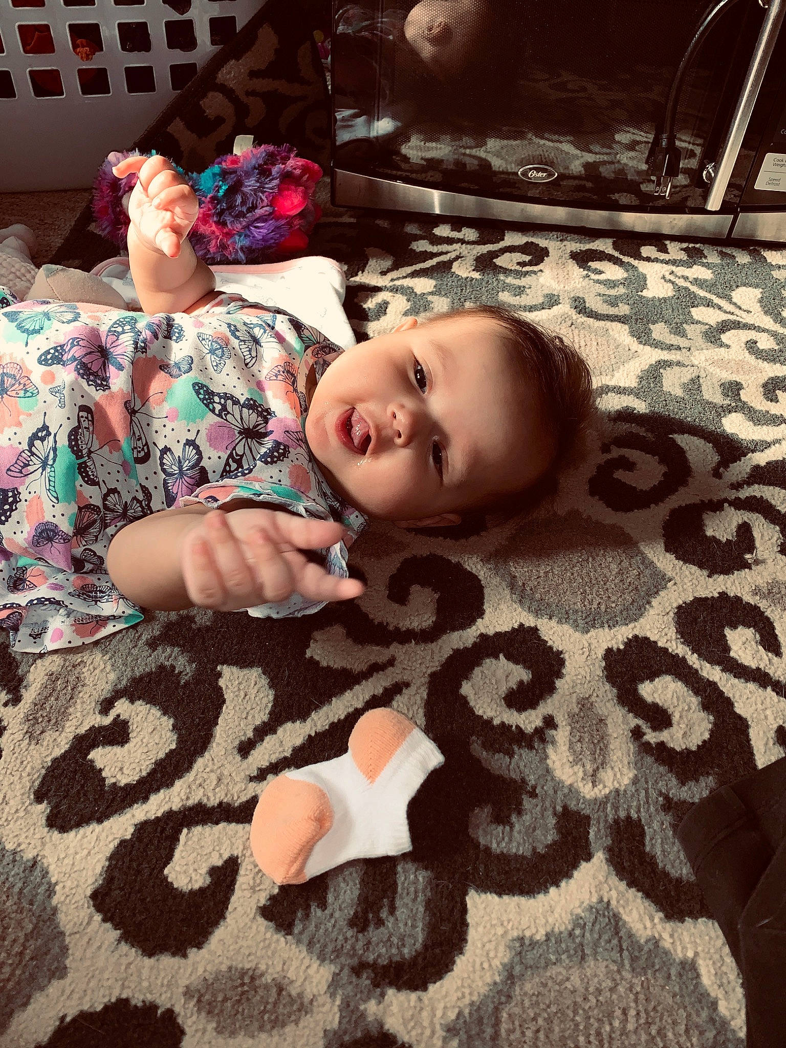 Laylah joined the competition — help win amazing prizes! art, baby, child, couch, floor, flooring, fun, leg, person, room, sitting, textile, toddler