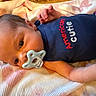 Addisyn joined the competition — help win amazing prizes! baby, infant, pacifier, blanket, clothing, onesie, cute, lying_down, face, head, hand, newborn, person, skin, soft_texture, baby_girl, baby_boy, indoors, closeup, sleeping