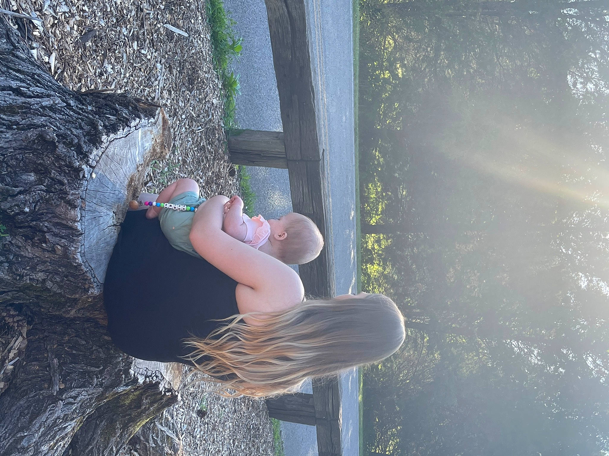Emrea is registered to the contest to win money with this photo: denim, electric_blue, eyewear, forest, fun, grass, grass_family, hat, human_leg, leisure, people_in_nature, person, recreation, rock, sitting, sun_hat, sunglasses, thigh, wood