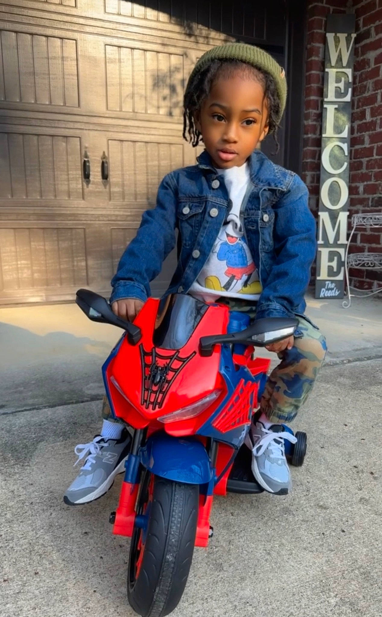 Luka joined the competition — help win amazing prizes! automotive_lighting, automotive_tire, automotive_wheel_system, bicycle_accessory, boot, cycling, denim, electric_blue, footwear, helmet, jacket, jeans, moped, motor_vehicle, motorcycle, person, personal_protective_equipment, tire, toddler, uniform