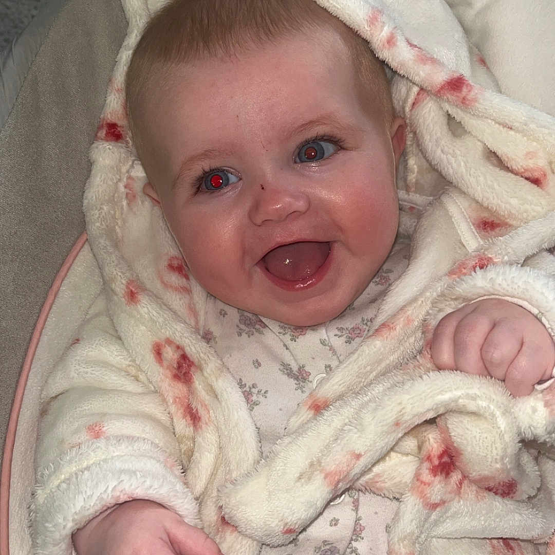 Darcy-Leigh is registered to the contest to win money with this photo: baby, bed, blanket, bonnet, clothing, face, furniture, happy, hat, head, homedecor, knitwear, laughing, newborn, person, photography, portrait, quilt, sweater, towel