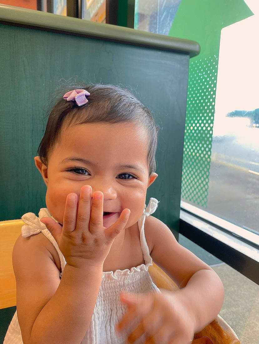 Kamila is registered to the contest to win money with this photo: abdomen, baby, baby_toddler_clothing, cheek, child, ear, eyelash, fashion_accessory, fun, gesture, happy, leisure, nail, nose, person, room, sitting, skin, smile, thumb