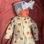 baby, blanket, bow, child, clothing, cozy, cute, hat, indoors, infant, newborn, onesie, pink, portrait, pumpkin_pattern, resting, sleeping, soft, toddler, warm