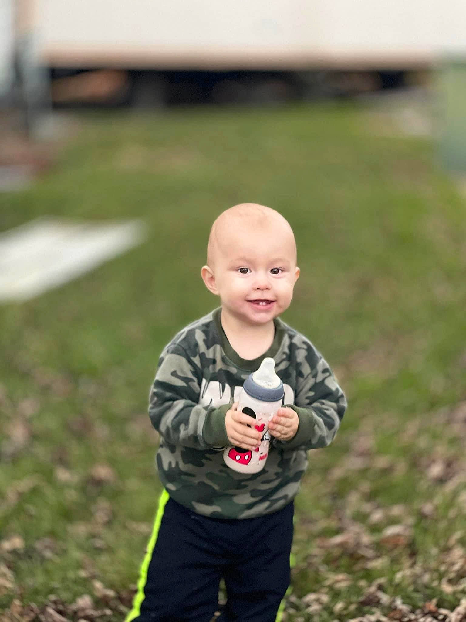 Karsyn joined the competition — help win amazing prizes! baby, ball, child, flash_photography, fun, grass, grassland, happy, joy, landscape, people_in_nature, person, plant, portrait_photography, recreation, sitting, sleeve, smile, soil, t_shirt
