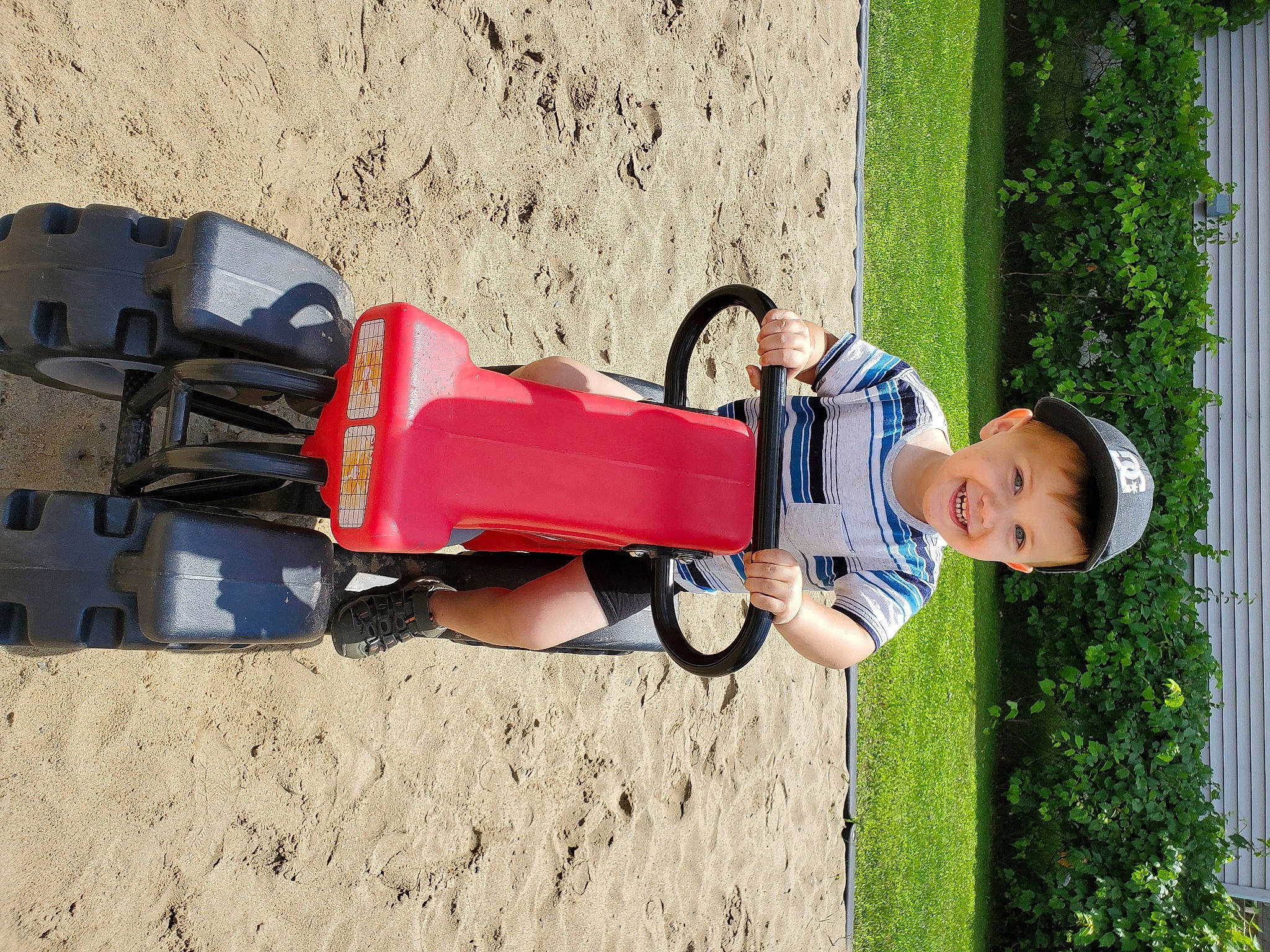 Jacob participe au concours pour gagner de l'argent avec cette photo : baby, baby_toddler_clothing, child, fun, grass, happy, headwear, joy, landscape, leisure, luggage_and_bags, motor_vehicle, people_in_nature, person, plant, play, recreation, sitting, soil, t_shirt