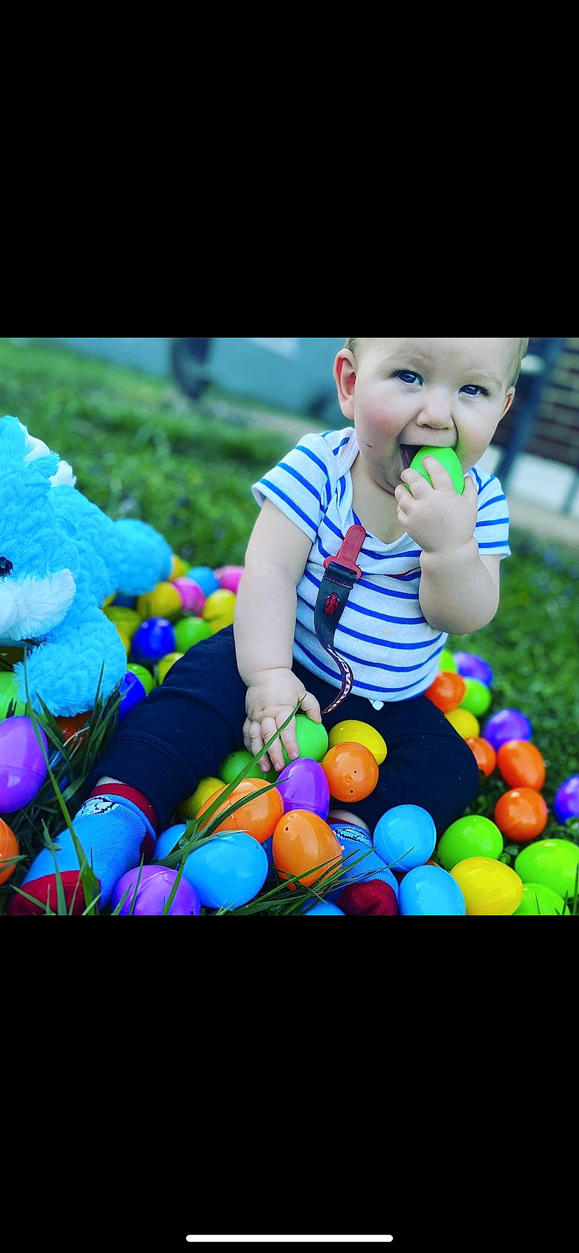 Landen is registered to the contest to win money with this photo: baby, baby_products, baby_toddler_clothing, ball, child, easter, electric_blue, event, fun, grass, happy, headwear, leisure, nature, people_in_nature, person, play, product, recreation, sitting