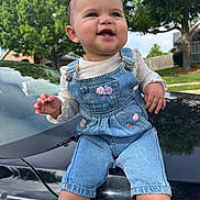 Aurora joined the competition — help win amazing prizes! baby, child, denim_overalls, smiling, outdoor, car, hood, trees, greenery, sunlight, cute, happy, person, clothing, face, shorts, nature, daylight, infant, blue