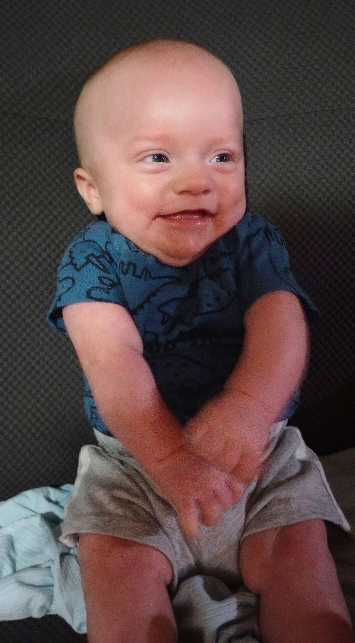 River is registered to the contest to win money with this photo: baby, baby_toddler_clothing, cheek, chest, chin, eye, finger, happy, head, human_body, joint, joy, knee, nose, person, pink, skin, sleeve, smile, thigh