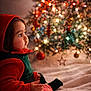 Vaayu joined the competition — help win amazing prizes! child, toddler, christmas_tree, holiday, festive, red_hood, striped_pants, indoors, decorations, lights, soft_blanket, cute, portrait, side_view, holiday_outfit, cozy, celebration, christmas, seasonal, warm_lighting