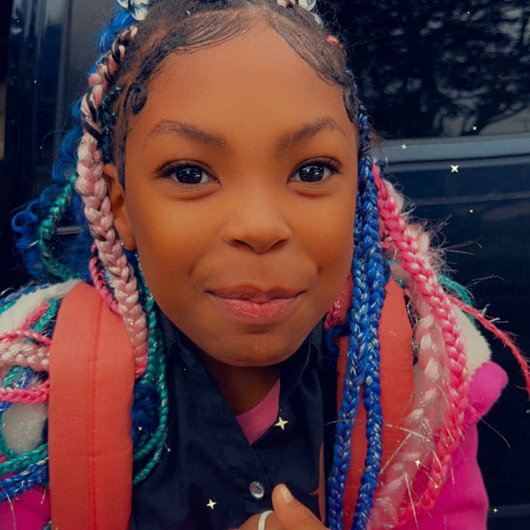 Aryianna is registered to the contest to win money with this photo: accessories, bead, bodypart, child, clothing, face, female, finger, girl, hair, hand, happy, head, mouth, nail, person, photography, portrait, smile, turquoise