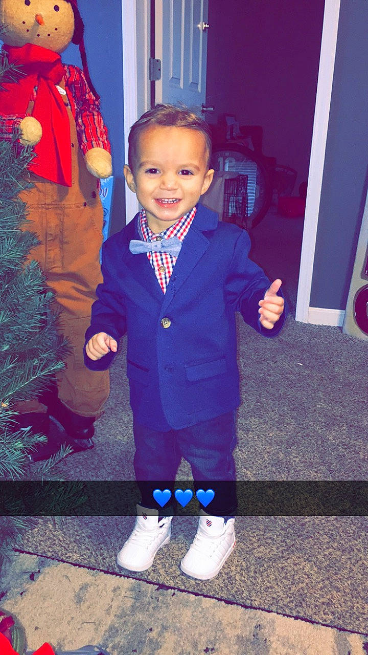 Kylar joined the competition — help win amazing prizes! child, costume, fun, joy, outerwear, person, purple, shoe, smile, standing, suit, toddler, uniform