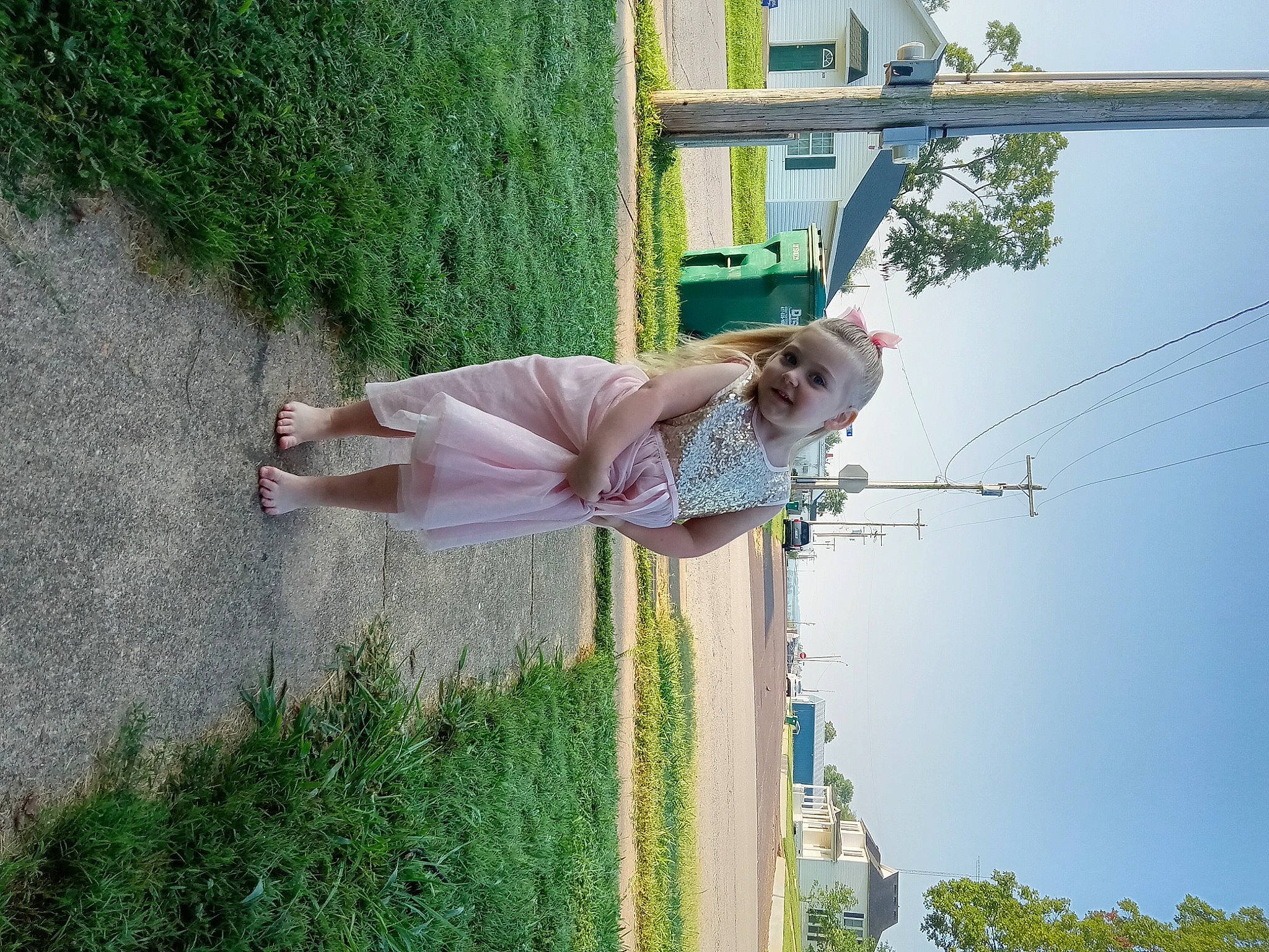 Valkyrie is registered to the contest to win money with this photo: electrical_supply, electricity, fun, grass, green, happy, joy, leisure, line, overhead_power_line, people_in_nature, person, plant, pole, public_utility, sky, smile, toddler, tree, vacation