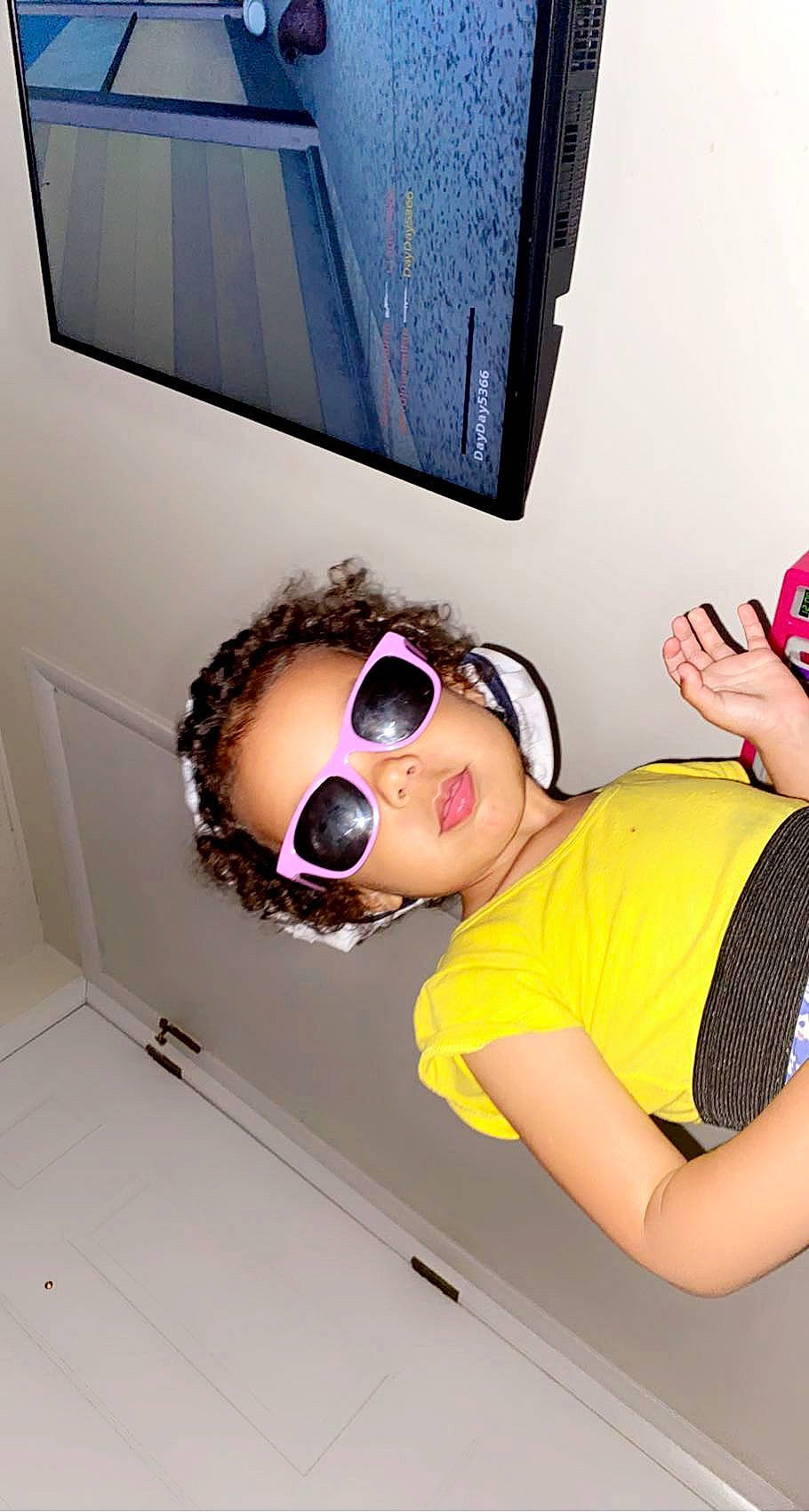 Myla joined the competition — help win amazing prizes! black_hair, cool, elbow, eyewear, finger, fun, gesture, glasses, goggles, hand, happy, headgear, leisure, mouth, person, personal_protective_equipment, purple, shoulder, sunglasses, thigh