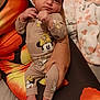 Nalia a rejoint le concours — aidez-le/la à gagner de superbes lots ! adult, baby, bed, blanket, cartoon_characters, clothing, cozy, cute, donald_duck, floral_pattern, foot, hand, indoor, infant, minnie_mouse, onesie, person, portrait, sitting, skin