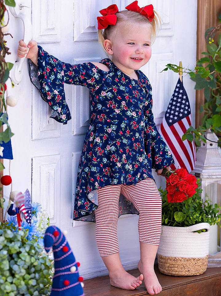 Josephine is registered to the contest to win money with this photo: baby_toddler_clothing, blue, clothing, electric_blue, event, flowerpot, happy, joy, pattern, person, photograph, pink, plant, red, sleeve, smile, snapshot, standing, textile, toddler