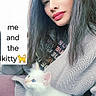 person, cat, kitten, white_cat, blue_eyes, long_hair, lipstick, sweater, cuddle, indoor, portrait, pet, cute, cozy, text_overlay, emoji, looking_up, soft_light, closeup, happy