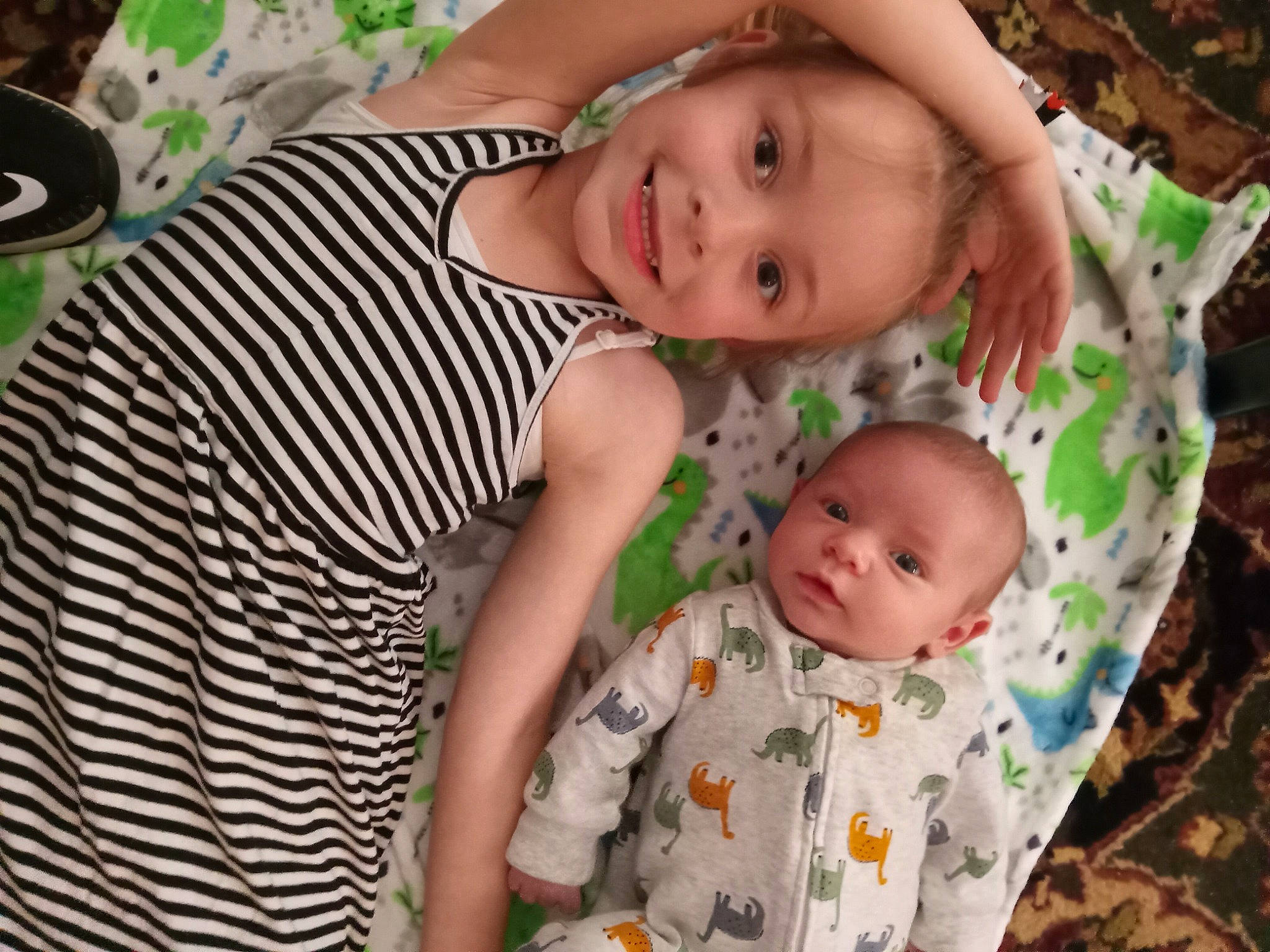 Paisley Rae is registered to the contest to win money with this photo: baby, baby_products, baby_toddler_clothing, cheek, child, clothing, comfort, event, fun, grass, happy, iris, joy, pattern, person, sitting, skin, sleeve, smile, toddler