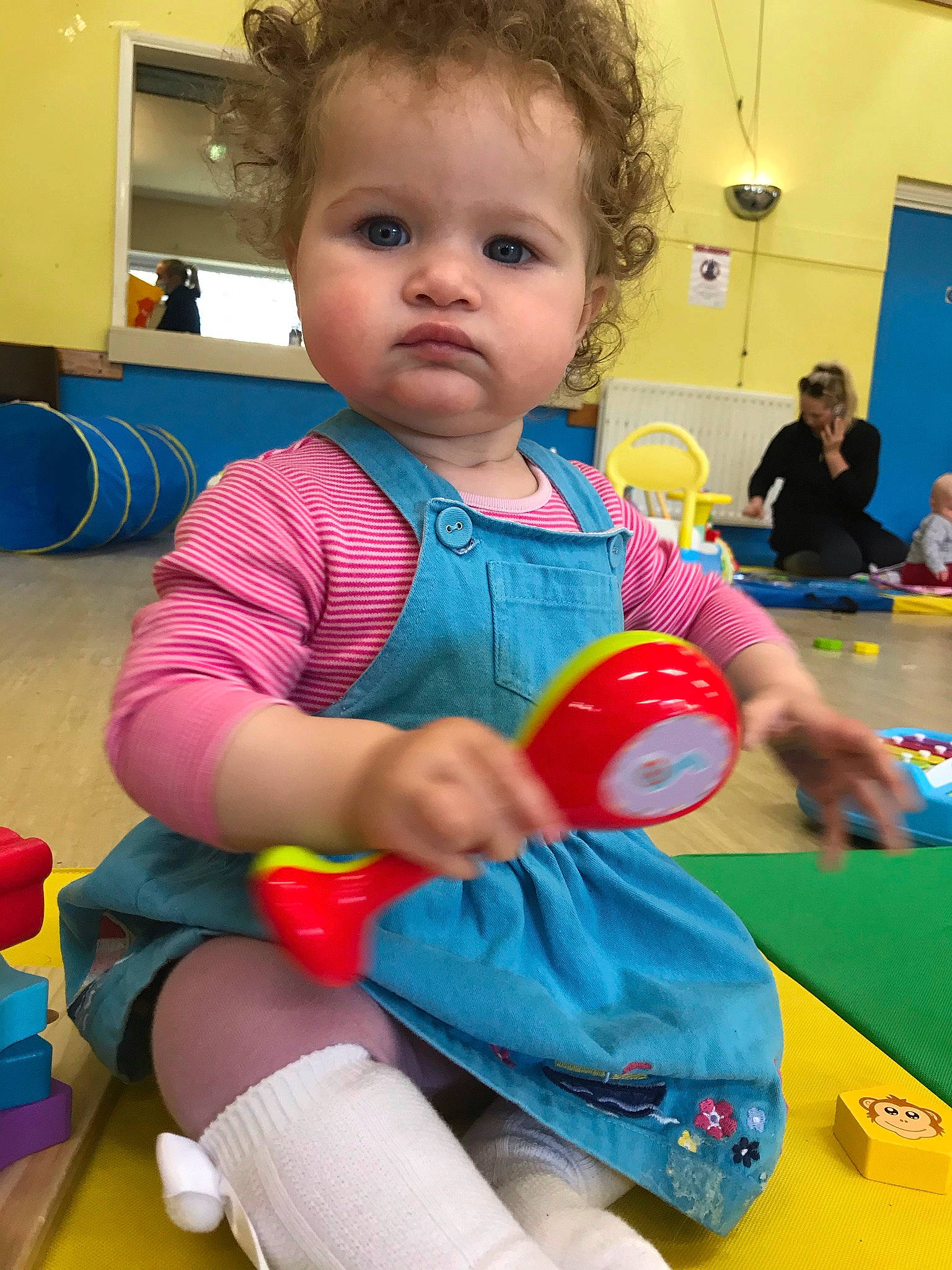 Adelaide is registered to the contest to win money with this photo: arm, baby, baby_playing_with_toys, baby_products, baby_toddler_clothing, baby_toys, blue, chair, child, fun, happy, head, joint, leisure, person, plastic, play, room, sitting, toddler