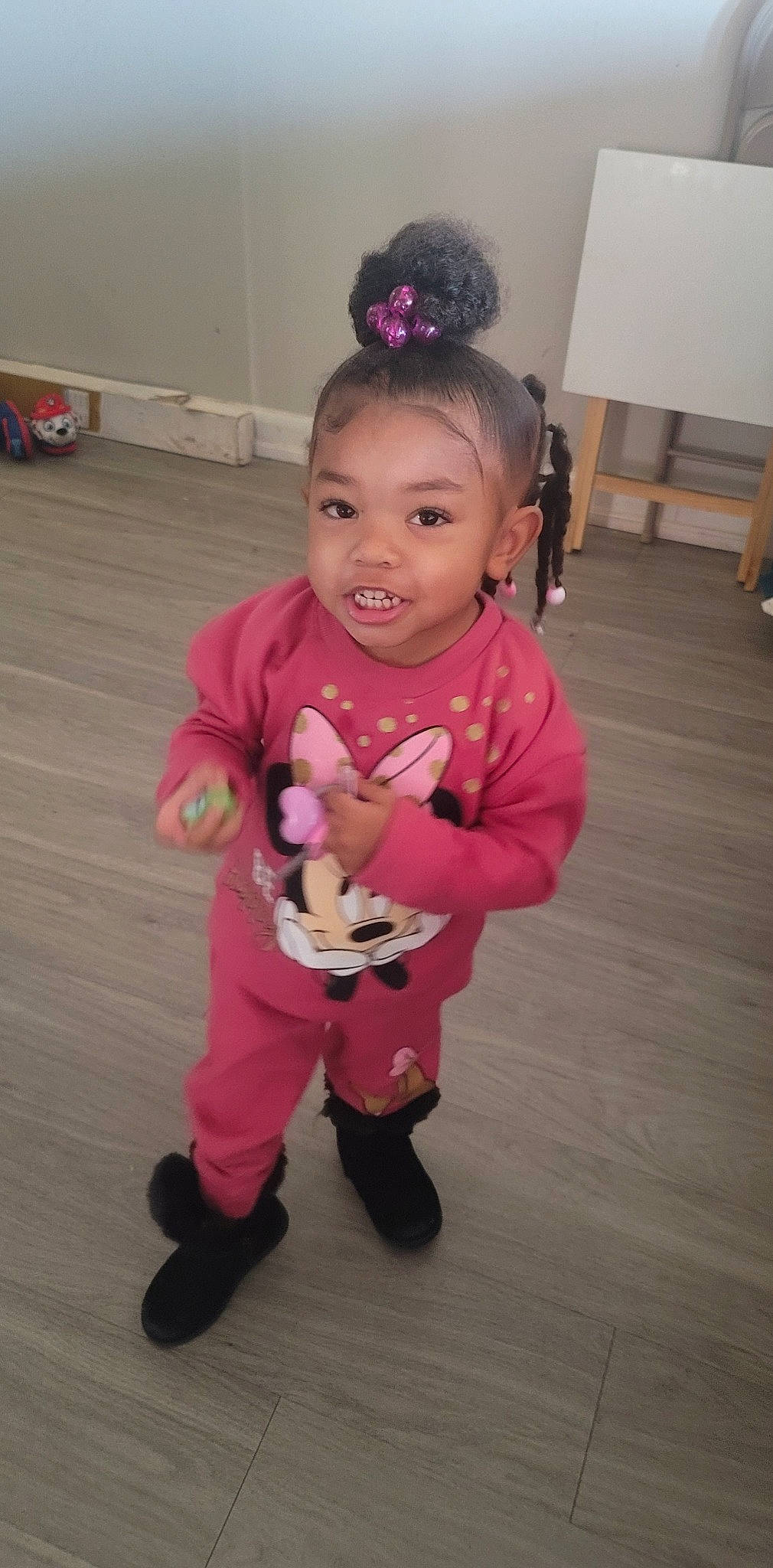 Kamylah joined the competition — help win amazing prizes! baby, baby_toddler_clothing, child, costume, event, flooring, fun, fur, hair_accessory, happy, hardwood, magenta, person, pink, room, skin, sleeve, smile, toddler, toy