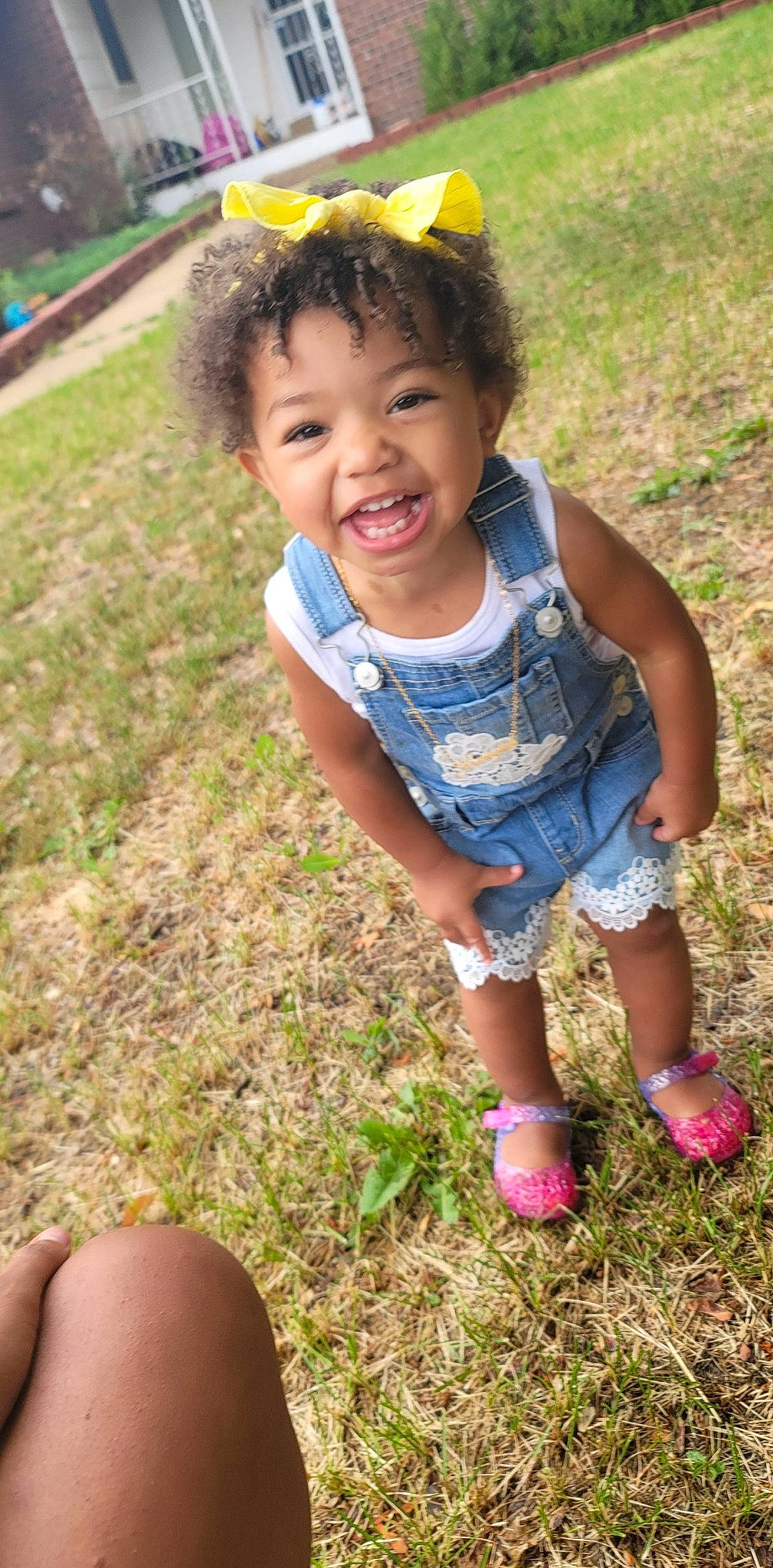 Kamylah joined the competition — help win amazing prizes! baby_toddler_clothing, eye, finger, grass, green, hairstyle, hand, happy, human_body, leaf, leg, light, people_in_nature, person, photograph, plant, skin, smile, sunlight, toddler