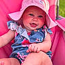 Hazel is registered to the contest to win money with this photo: baby, child, smiling, hat, pink, blue, floral, outdoor, sunhat, cute, happy, person, portrait, sitting, summer, skin, face, clothing, babywear, foot