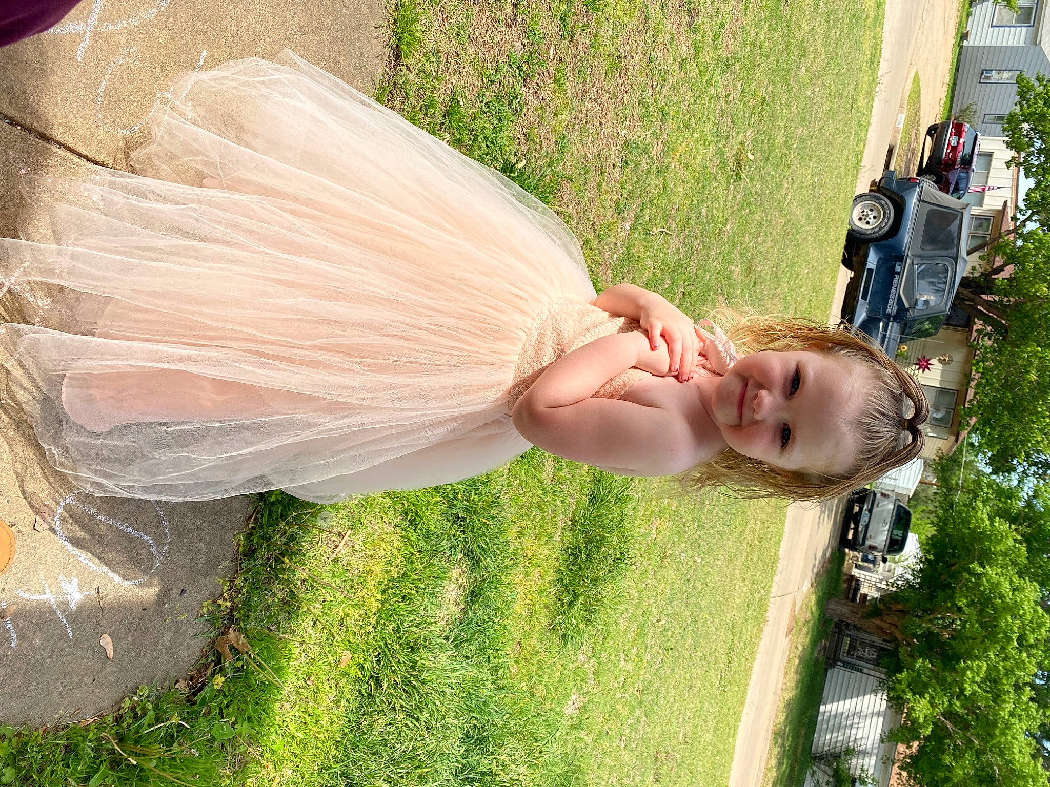 Avery is registered to the contest to win money with this photo: baby, bridal_accessory, bridal_clothing, car, child, dress, event, fashion_accessory, fun, gown, grass, happy, joy, landscape, lawn, leisure, people_in_nature, person, petal, plant