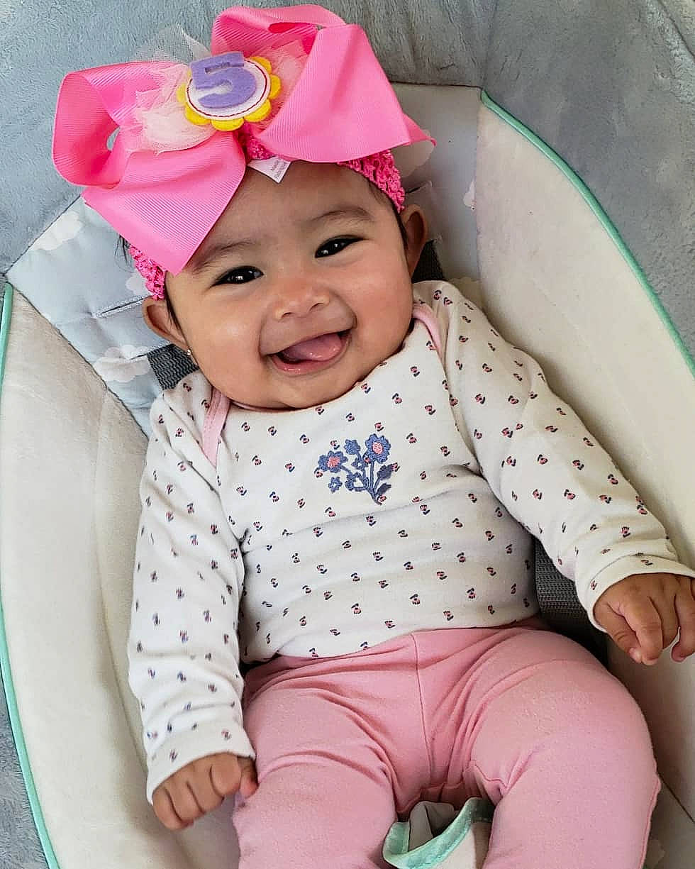 Jayleen joined the competition — help win amazing prizes! baby_products, child, hair_accessory, hat, headgear, headwear, infant, joy, person, pink, product, skin, smile, sun_hat, textile, toddler