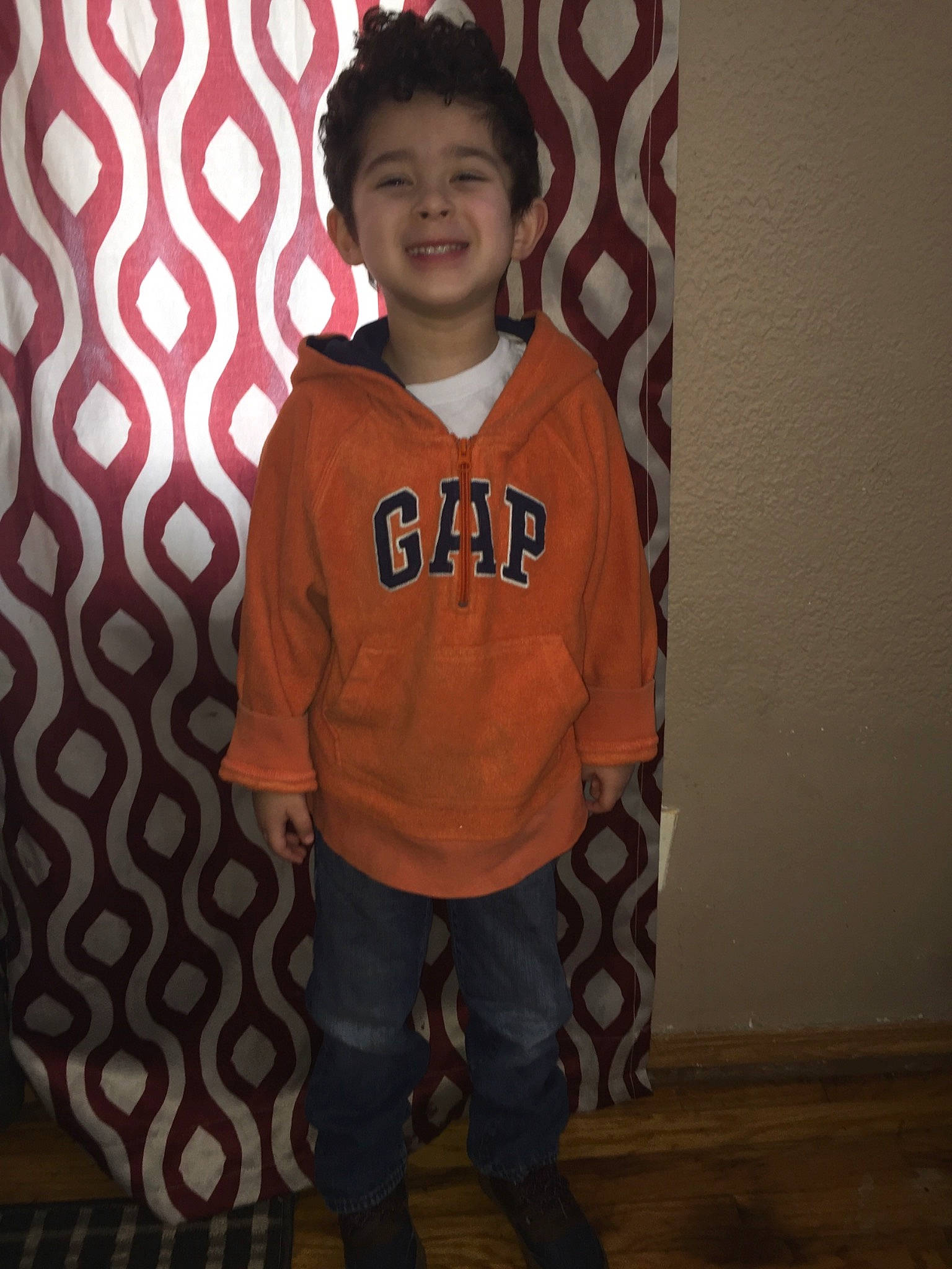 Jaelyn is registered to the contest to win money with this photo: child, cool, joy, outerwear, person, sleeve, smile, standing, t_shirt