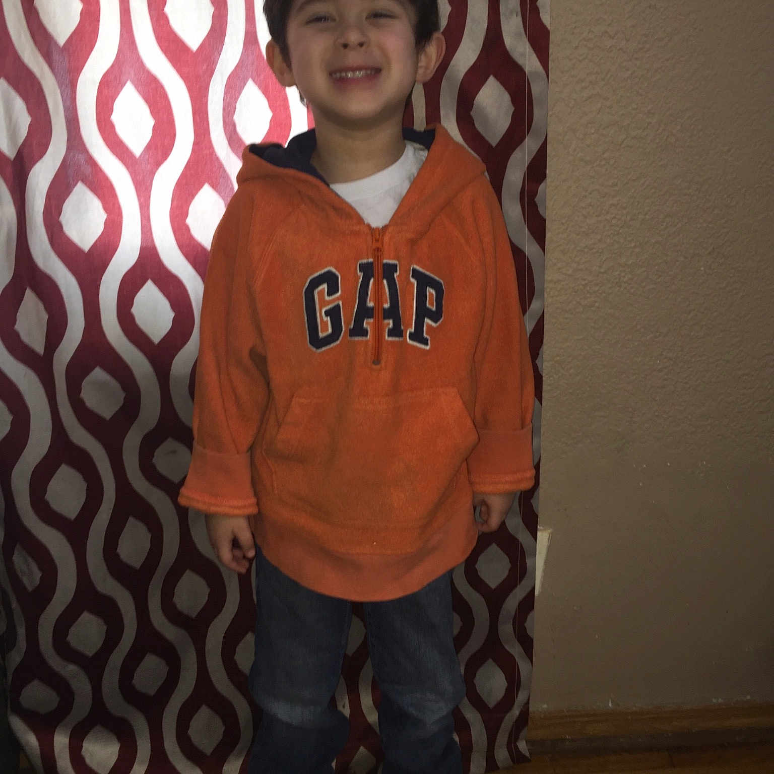 Jaelyn is registered to the contest to win money with this photo: child, cool, joy, outerwear, person, sleeve, smile, standing, t_shirt
