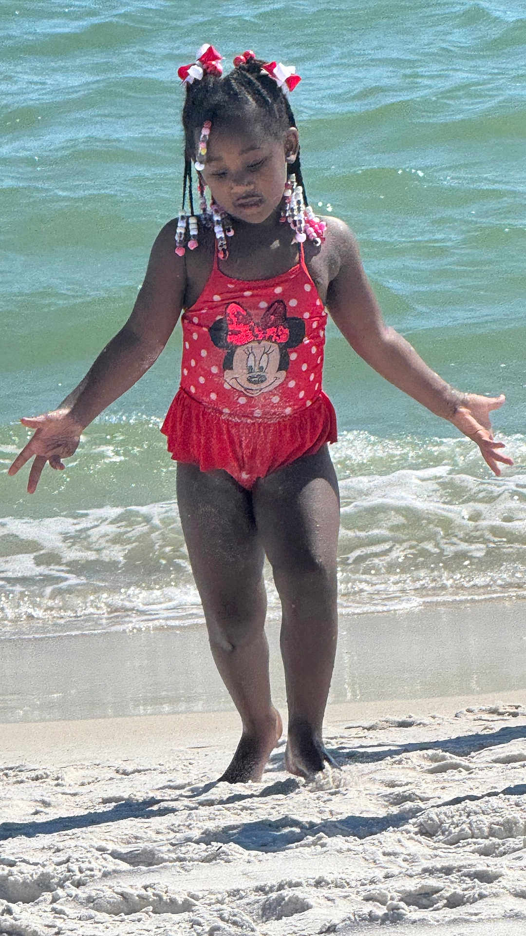 Tramira is registered to the contest to win money with this photo: beach, child, clothing, coast, face, female, girl, head, nature, outdoors, person, photography, portrait, sea, seawaves, shoreline, shorts, summer, swimwear, water