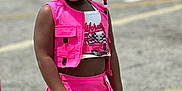 Tramira is registered to the contest to win money with this photo: accessories, child, clothing, dress, earring, electronics, face, female, girl, head, jewelry, miniskirt, mobilephone, person, phone, photography, portrait, road, shorts, skirt