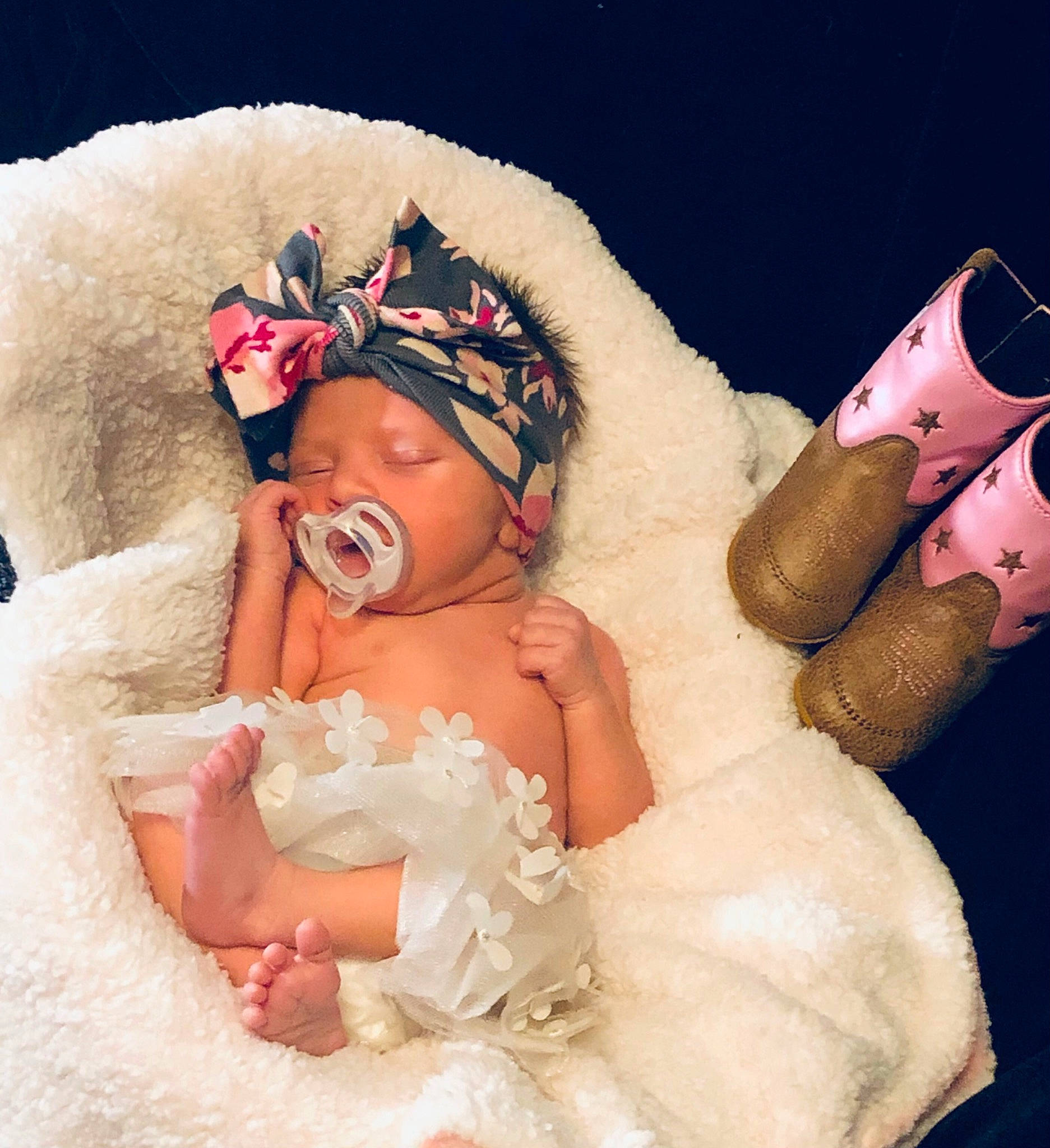 Adelaide joined the competition — help win amazing prizes! arm, baby, baby_toddler_clothing, bridal_accessory, child, comfort, dress, embellishment, eyelash, finger, flash_photography, fun, gesture, hand, happy, headgear, headpiece, headwear, person, petal