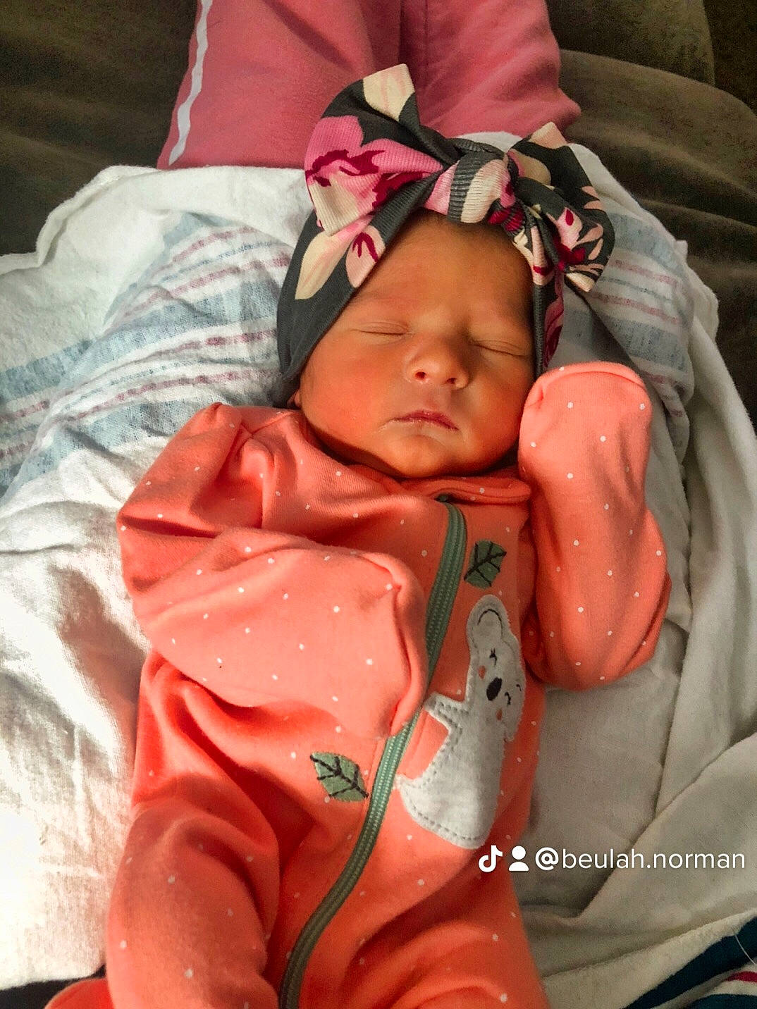 Adelaide is registered to the contest to win money with this photo: abdomen, baby, baby_carriage, baby_products, baby_sleeping, baby_toddler_clothing, cheek, chest, child, comfort, finger, headwear, joint, linens, lip, mouth, person, pink, skin, sleeve