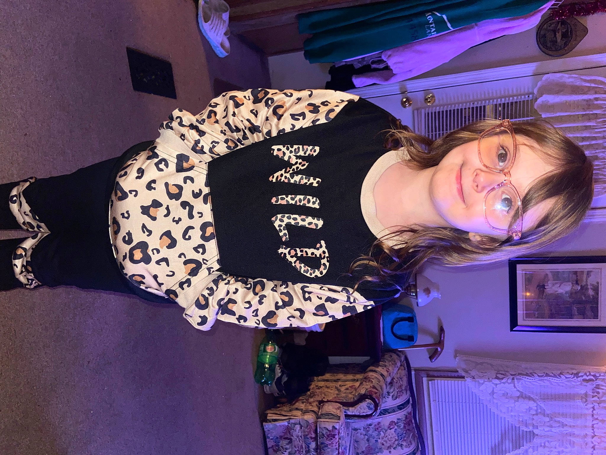 Talia joined the competition — help win amazing prizes! abdomen, elbow, electric_blue, eyewear, fashion_design, flash_photography, fun, fur, happy, human_leg, joy, magenta, pattern, person, picture_frame, purple, room, sleeve, smile, thigh