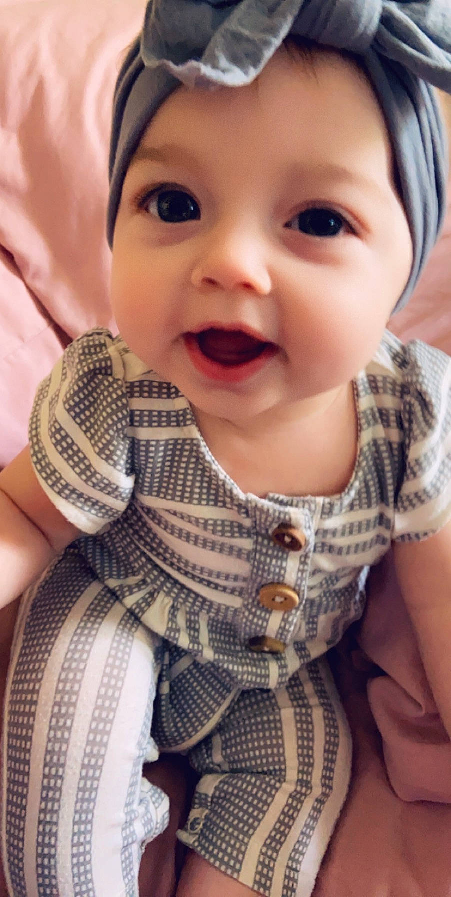 Rosalina is registered to the contest to win money with this photo: baby, beauty, cheek, child, chin, eye, face, facial_expression, finger, happy, head, lip, mouth, nose, pattern, person, product, skin, smile, textile