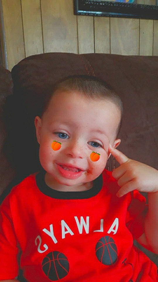 Izayic is registered to the contest to win money with this photo: baby, cheek, child, chin, ear, eye, face, facial_expression, forehead, head, joy, lip, mouth, nose, orange, organ, person, skin, smile, toddler