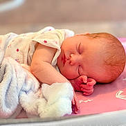 Alexis joined the competition — help win amazing prizes! newborn, baby, sleeping, blanket, soft_texture, pastel_colors, infant, peaceful, closeup, portrait, child, resting, pink, white, hand, face, delicate, cozy, cute, young