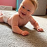Emily joined the competition — help win amazing prizes! baby, infant, smile, carpet, indoor, happy, cute, child, diaper, person, skin, hair, floor, furniture, home, crawling, toddler, light, portrait, expression