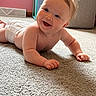 baby, smiling, carpet, indoor, child, diaper, happy, cute, skin, head, person, infant, toddler, hair, floor, home, furniture, light, expression, portrait