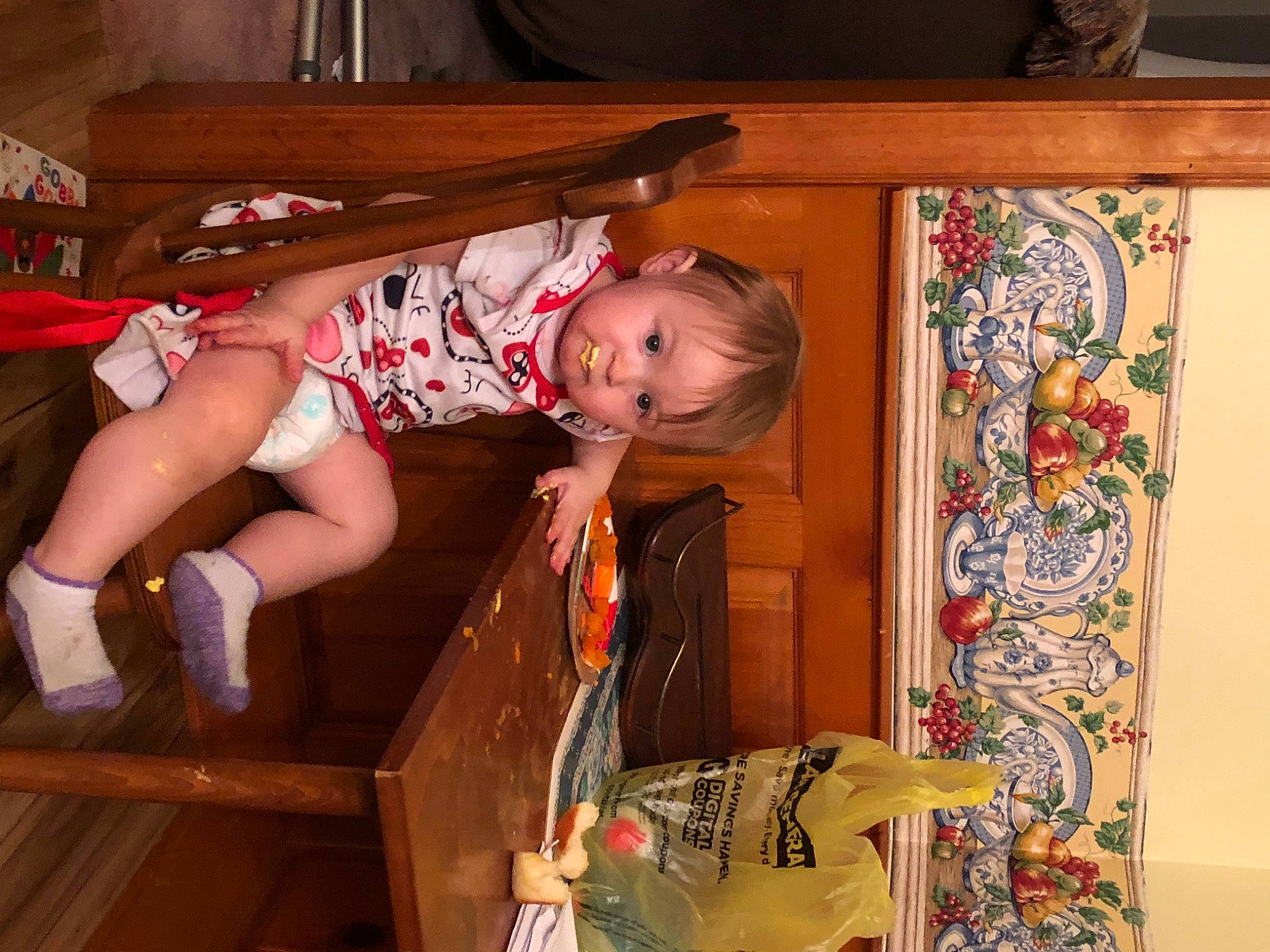 Avory is registered to the contest to win money with this photo: art, baby, baby_products, baby_toddler_clothing, cabinetry, child, drawer, fun, hardwood, human_leg, knee, person, room, sandal, smile, sock, thigh, toddler, visual_arts, wood