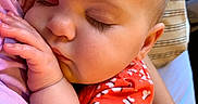 Jersey is registered to the contest to win money with this photo: baby, cheek, child, ear, face, finger, hand, head, lip, mouth, nail, neck, nose, skin, toddler