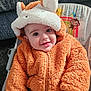 Cole joined the competition — help win amazing prizes! baby, child, orange_jacket, hood, ears, smile, happy, infant, cute, plush, seated, baby_seat, illustration, monkey, sun, clothing, portrait, face, warm, cozy
