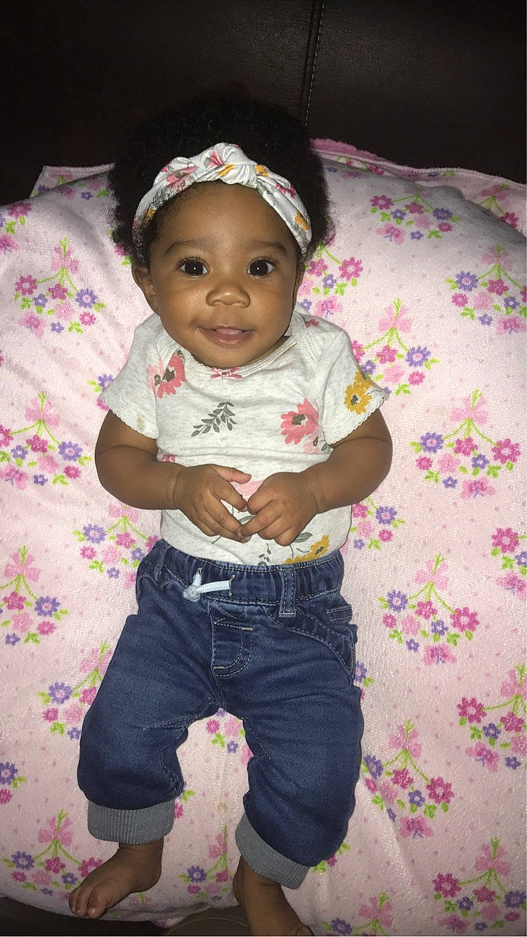 Laylani joined the competition — help win amazing prizes! baby, baby_products, baby_toddler_clothing, cheek, child, face, facial_expression, fun, happy, head, linens, magenta, pattern, person, pink, purple, skin, sleeve, smile, t_shirt