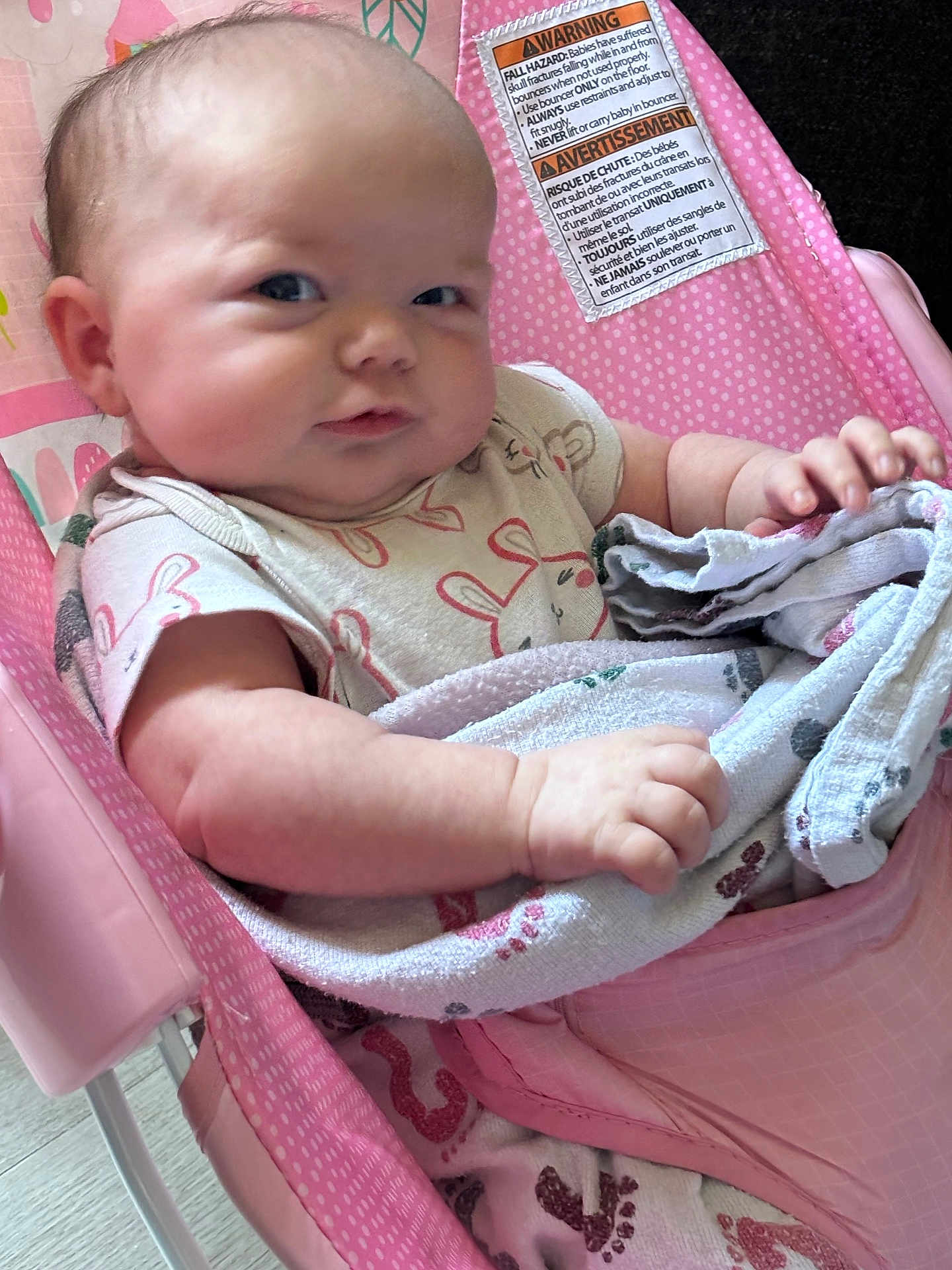 Sellia is registered to the contest to win money with this photo: baby, infant, child, pink, blanket, baby_chair, polka_dot, soft_toy, cute, clothing, face, hand, skin, indoor, comfort, expression, person, sitting, closeup, relax