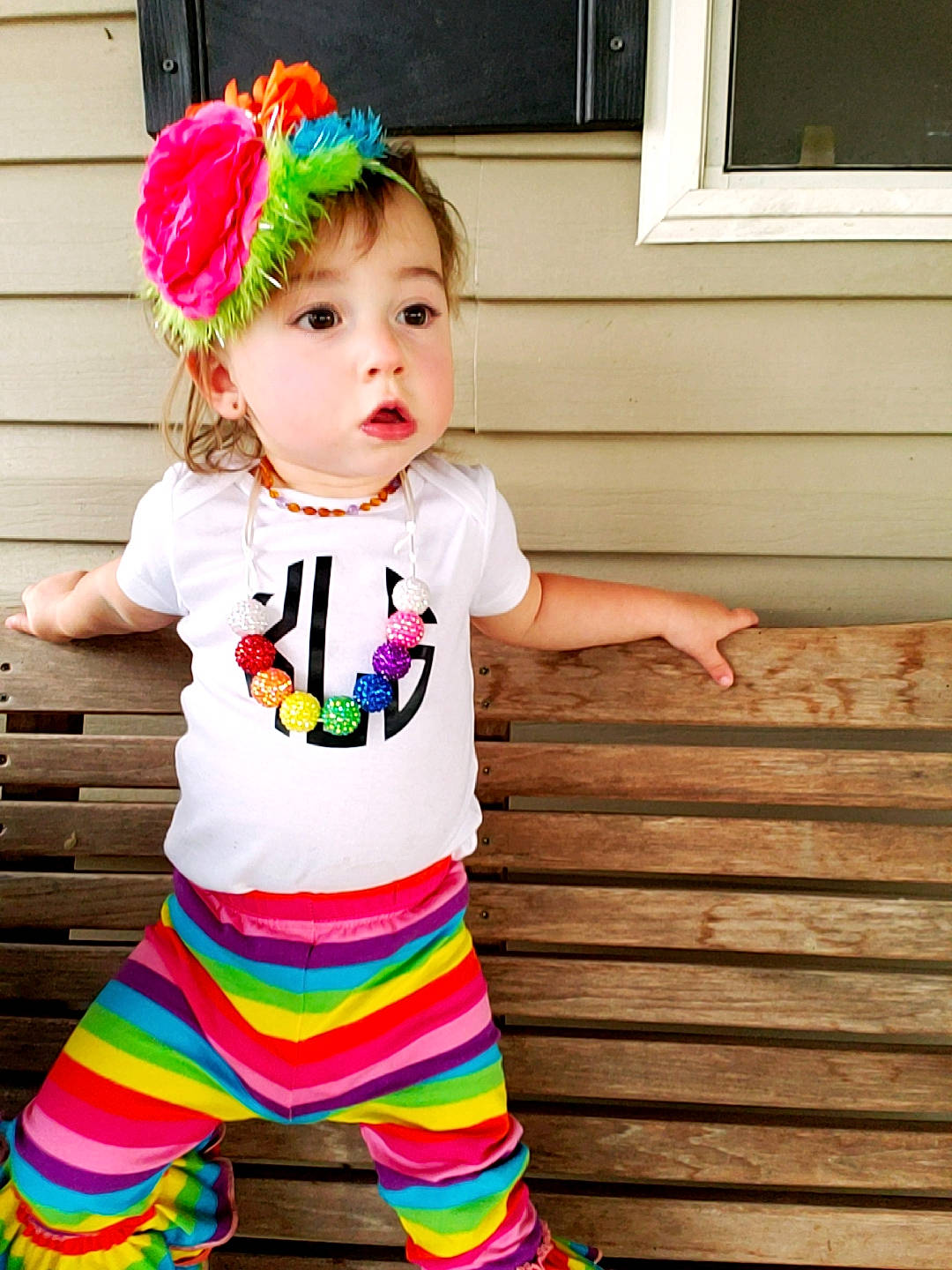 Kynzlee joined the competition — help win amazing prizes! baby, baby_bloomers, baby_products, baby_toddler_clothing, child, child_model, clothing, design, fashion_accessory, hair_accessory, headband, leggings, pattern, person, pink, product, sleeve, t_shirt, toddler, yellow