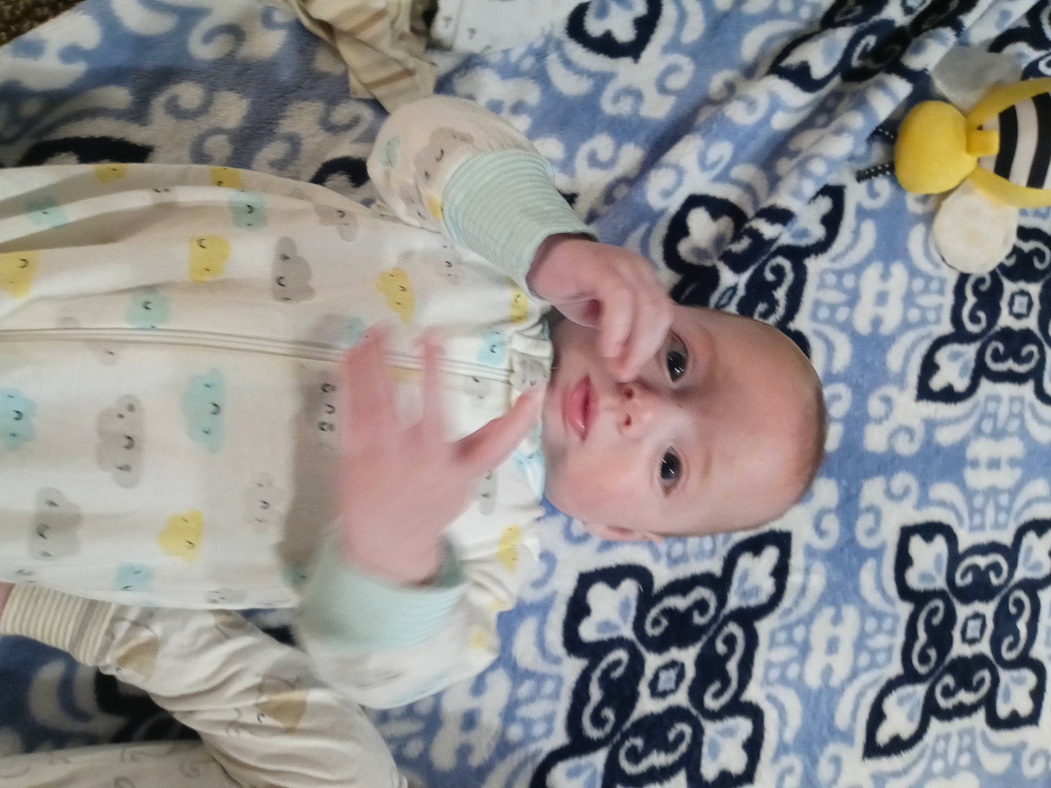 James is registered to the contest to win money with this photo: baby, baby_products, baby_toddler_clothing, cheek, child, comfort, happy, linens, pattern, people, person, product, room, skin, sleeve, toddler