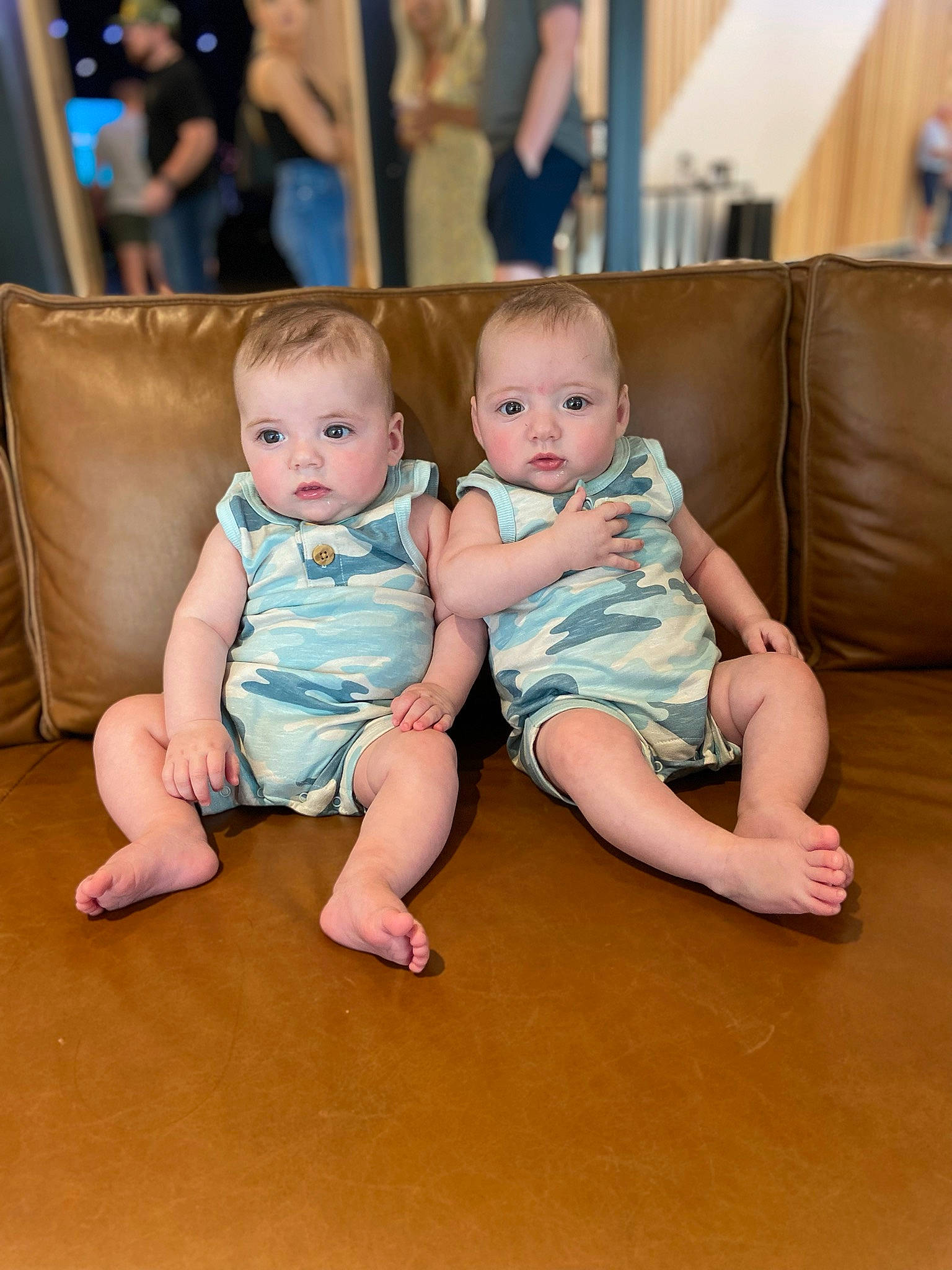 Camren is registered to the contest to win money with this photo: baby, baby_toddler_clothing, cheek, event, floor, flooring, foot, fun, happy, hardwood, head, human_leg, leg, leisure, person, sitting, skin, t_shirt, thigh, toddler
